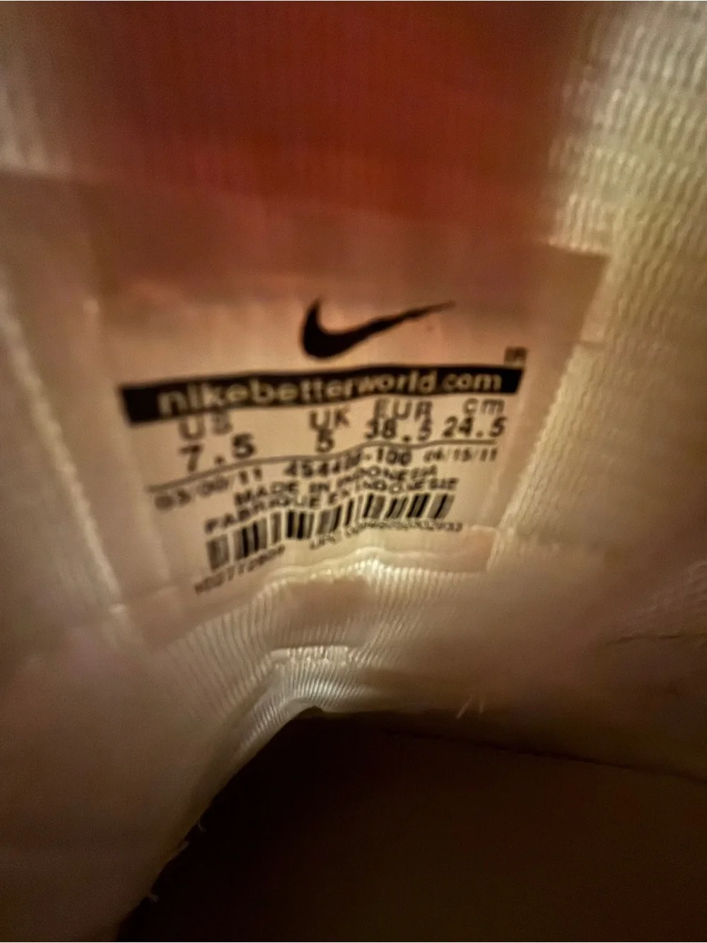 Nike White Sneakers with Pink Swoosh Accents